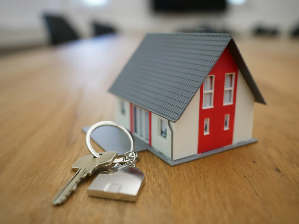 Keys being handed to a new homeowner